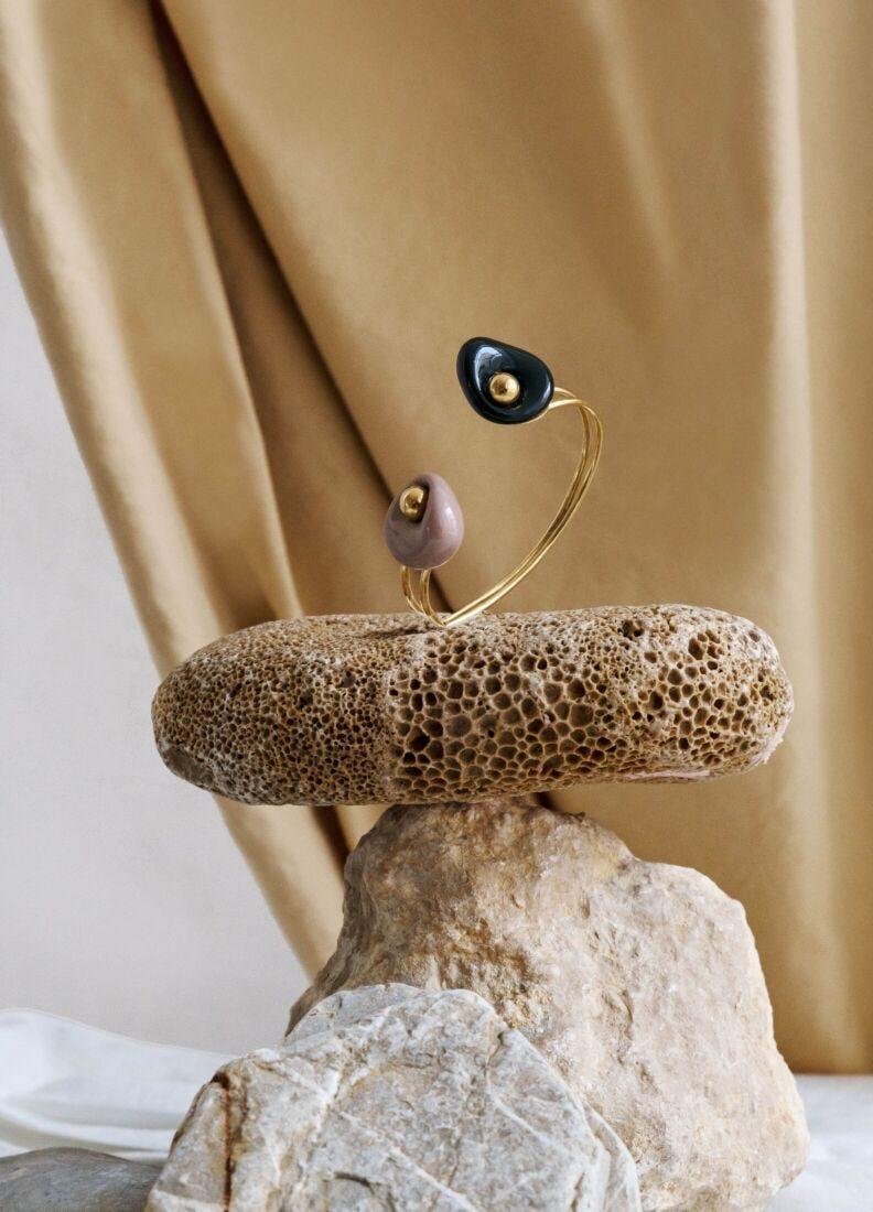 lladro Brazalete Golden Pebbles. Negro beige y lustre oro En línea