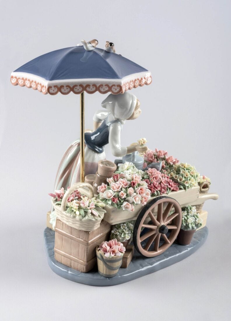 lladro Escultura mujer El puesto de flores Grandes ahorros