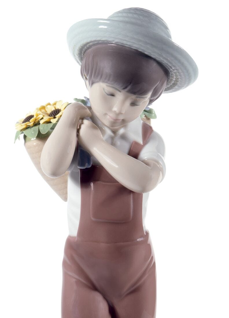 lladro Figura niño Flores a la espalda Últimos 2 días
